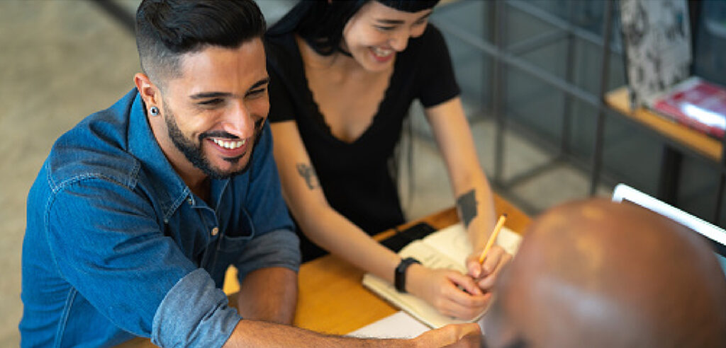 Couple signing contract for car purchase